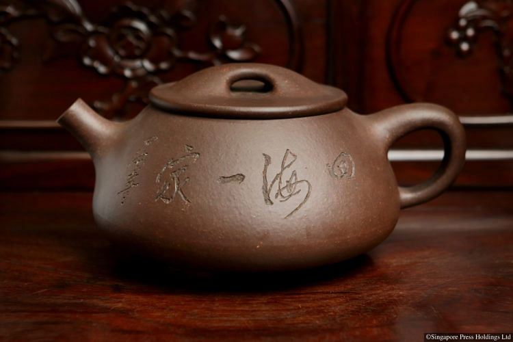 Would you buy a $200,000 teapot ? 紫砂壶藏家蔡华春舍不得嫁的女儿